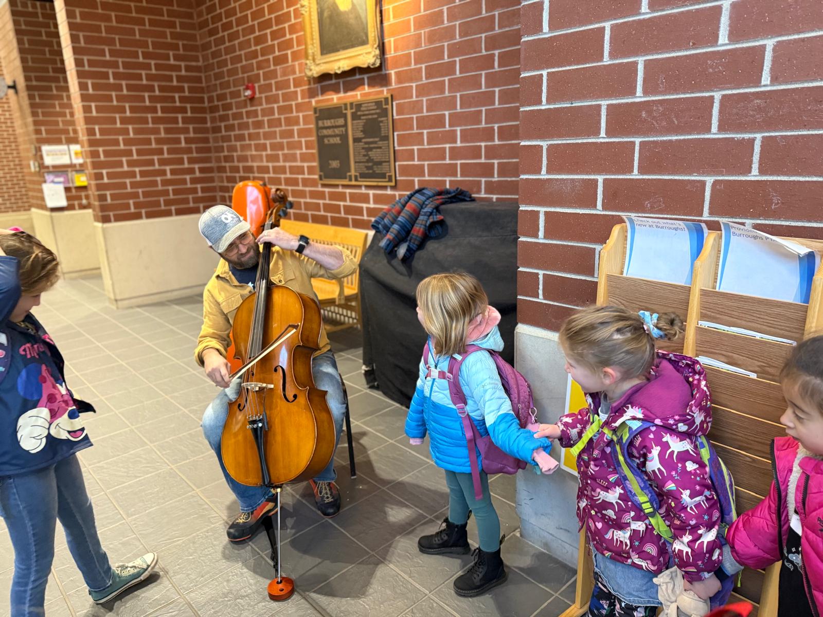 Michael playing cello at school