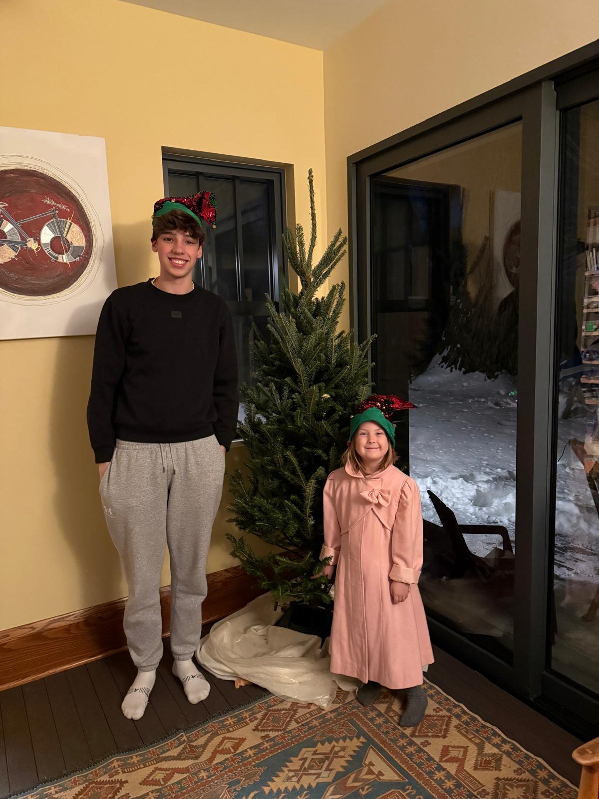 Eduardo and Coraline by Christmas tree