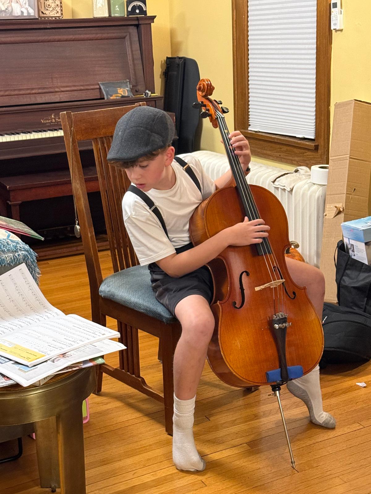 Samuel playing cello
